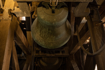 church bells inside the martinikerk Martinitoren in Groningen Holland. Dutch religious articles sound chimes to mark time and calls in historic st martins church in Netherlands