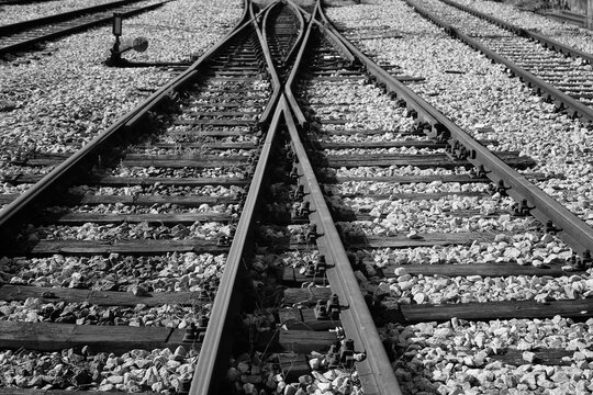 railroad tracks black and white photo