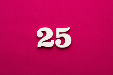 Number 25 - White wooden number on rhodamine red background