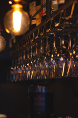 Glasses hanging from bar