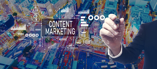 Content marketing theme with businessman in a city at night
