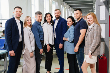 Fototapeta premium a group of men and women in coworking. the concept of teamwork.