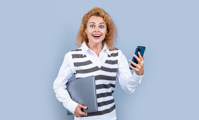 Fototapeta premium young manager woman hold device in studio. manager woman with laptop device.