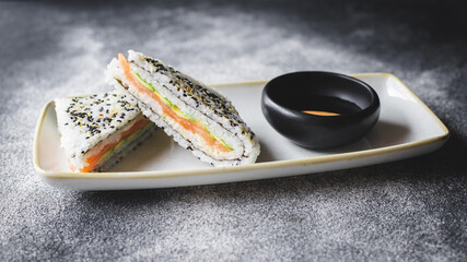 Huge seafood sushi sandwich. Asian food.