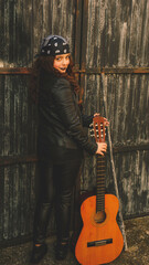 teenage woman with guitar