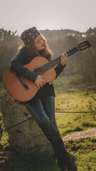 Obraz premium teenage woman with guitar
