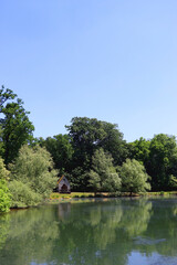 Beautiful landscape with lake and trees in park Maksimir, in Zagreb, Croatia.