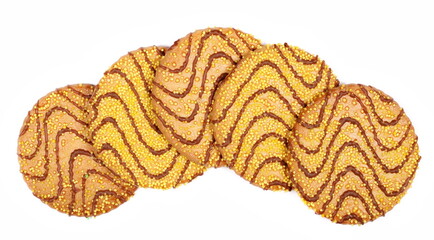 Cookies with milk chocolate drizzle, yellow sprinkles and butter isolated on white, top view