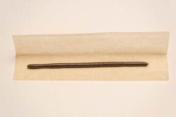 High quality Moroccan hashish, cannabis marijuana extract on rolling paper. Drugs narcotic addiction concept, smoke and chill