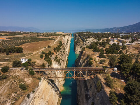 Aerial view Corinth Canal by drone. Summer Greece. Beach. Mediterranean sea.
