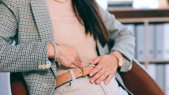 Hands, stomach pain and business woman in office with menstrual cramps or period in workplace. Sick, health and female employee suffering with painful tummy ache, abdominal problem or constipation.