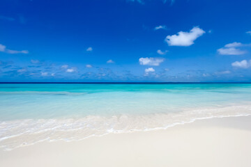 Fototapeta na wymiar White sand beach with turquoise water and blue sky