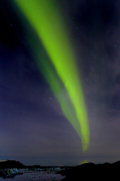 Northern Lights erupt overhead in Iceland over the Glacial Lagoon