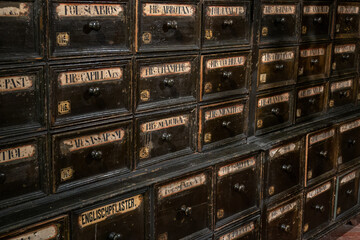 Old drawers with herb labels.