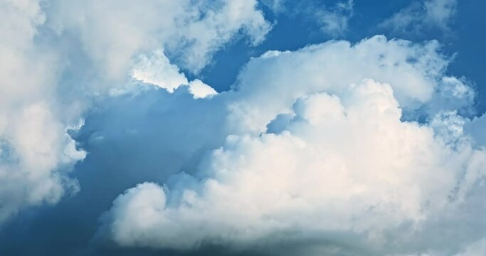 Blue sky and white cloud natural background.  4K sky cloud real time video.