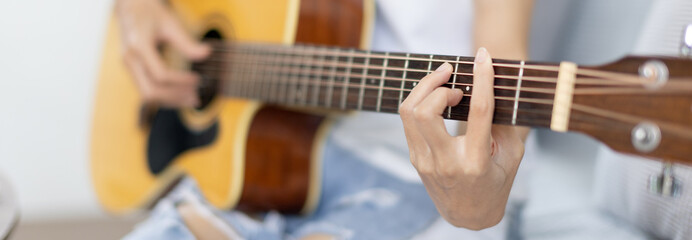 Close up fingers playing guitar strings, Strum to make a sound, Acoustic guitar, Catching guitar...