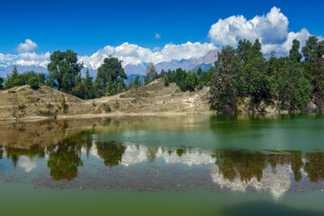 Holy Devariyatal, Deoria Tal, Devaria or Deoriya, an emerald lake with miraculous reflections of Chaukhamba peaks on its crystal clear water. Chaukhamba peaks, Garhwal Himalayas, Uttarakahnd, India.