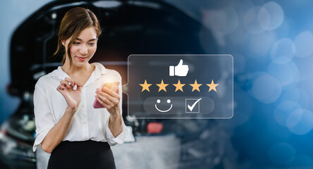 Asian woman use smartphone to give five star with excellent experience rating review