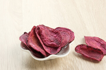 Fototapeta premium Keripik Ubi Ungu or Sweet Potato Chips, Indonesian traditional snack. 