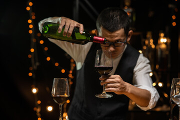 Barman pouring whiskey whiskey glass beautiful night