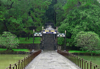 Fototapeta premium Connecting bridge leading to mountain of Minh Mang Emperor resting place in Hue, Vietnam on October 10, 2022