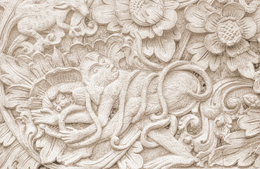 Ivory color carved concrete architectural detail on wall