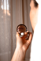Fototapeta premium girl getting out of the shower in a vintage hotel room