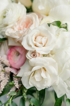 Upclose photo of white and pink roses