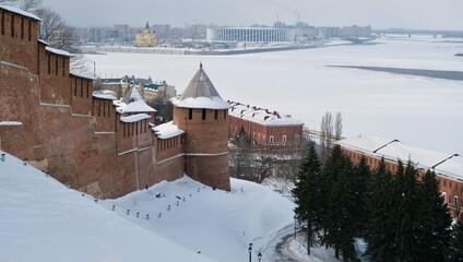 The Nizhny Novgorod Kremlin against the backdrop of the confluence of the two rivers Oka and Volga - 577289745