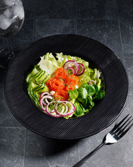 salad vegetables and salmon
