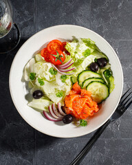 salad vegetables and salmon
