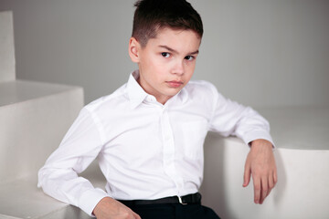 portrait a boy in white shirt