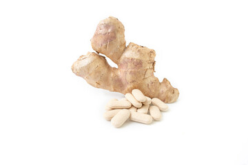 Zingiber officinale Fresh Ginger pills, close up isolated on white