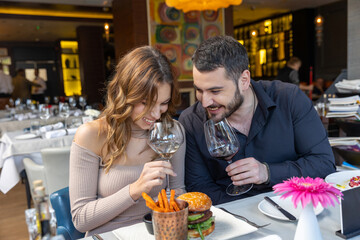 Romantic couple having lunch in the restaurant