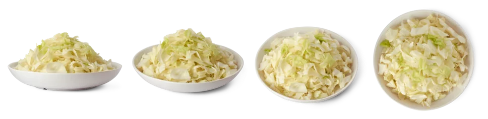 Fototapete Frisches Gemüse set of bowl or plate full of chopped green cabbage leaves, white and pale green highly nutritious and rich in fiber vegetable ready to cook, isolated in different angles