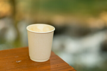 cup of coffee in natural background.