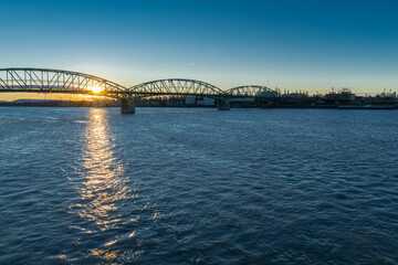 Fototapeta na wymiar Bridge over the Danube in Austria at sunset