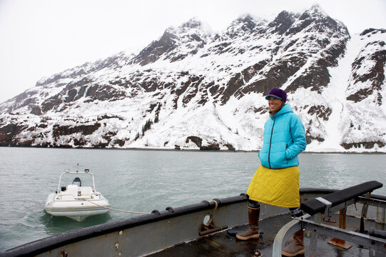 Passengers of the M/V Milo on the aft deck in Iniskin Bay, Cook Inlet