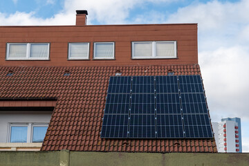 solar cells on a roof of a residential house