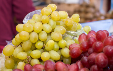 A bunch of grapes in a basket
