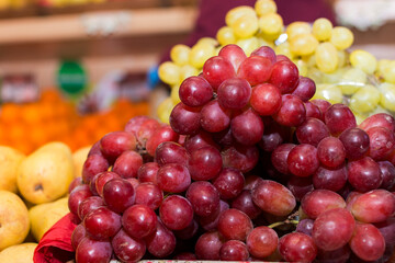 A bunch of grapes in a basket