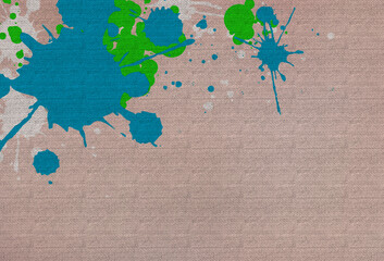 青と黄緑や白の大きな飛沫のある生成りの布地のテクスチャー