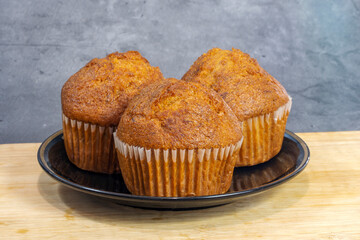 Banana cup cake on a wooden board