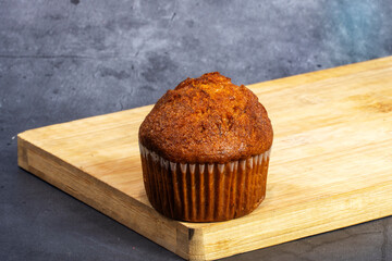 Banana cake on a wooden chopping board