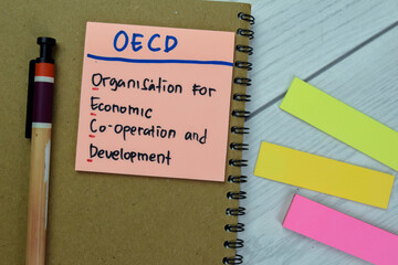 Concept of OECD - Organisation for Economic Co-operation and Development write on sticky notes...