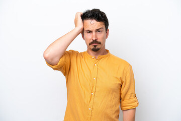 Fototapeta premium Young man with moustache isolated on white background with an expression of frustration and not understanding