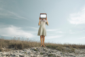 surreal woman with her head hidden by a tv that projects.the disconnect