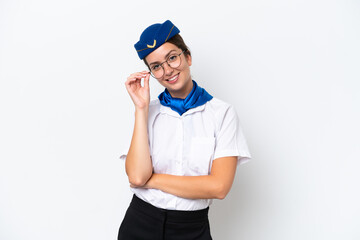 Airplane stewardess caucasian woman isolated on white background with glasses and happy
