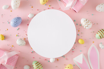 Naklejka na ściany i meble Easter concept. Flat lay photo of white circle colorful eggs easter bunny ears gift boxes sprinkles on pastel pink background with blank space
