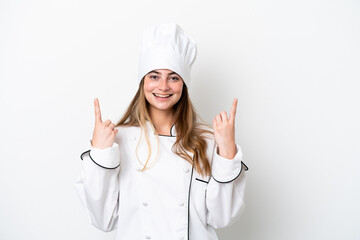 Young caucasian chef woman isolated on white background pointing up a great idea